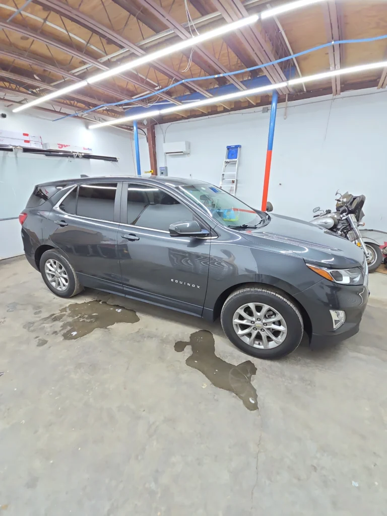 professional window tinting service being applied to a vehicle enhancing privacy and reducing heat in pensacola fl