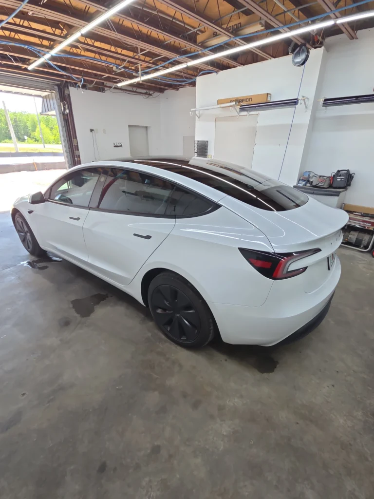 professional window tinting application on vehicle enhancing privacy and reducing heat in pensacola fl